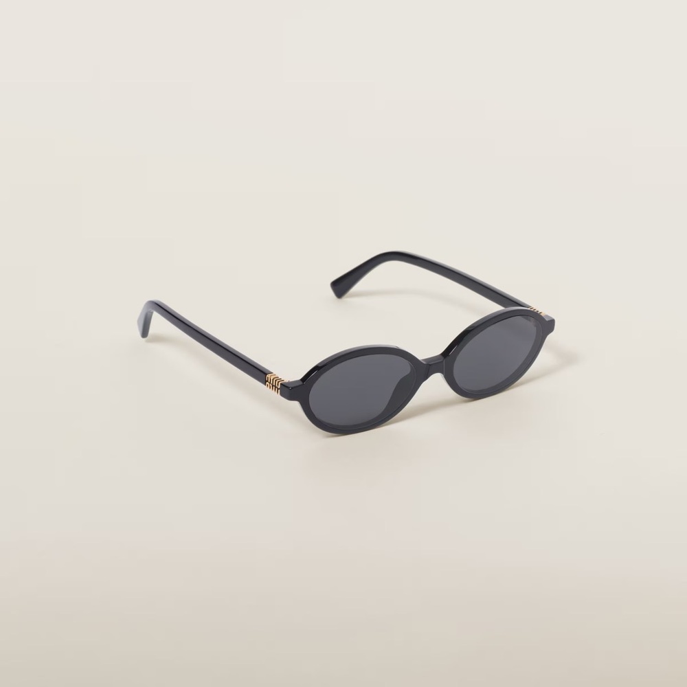 Miu Miu Regard Glasses